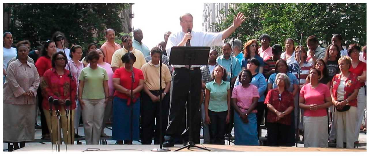 Chris White Speaking on 114th Street in Manhattan  (Photo by Dan Voll)